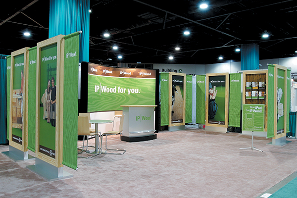 Modular display system comprised of 7-foot free-standing graphics panels constructed from actual IP Wood lumber and plywood products.